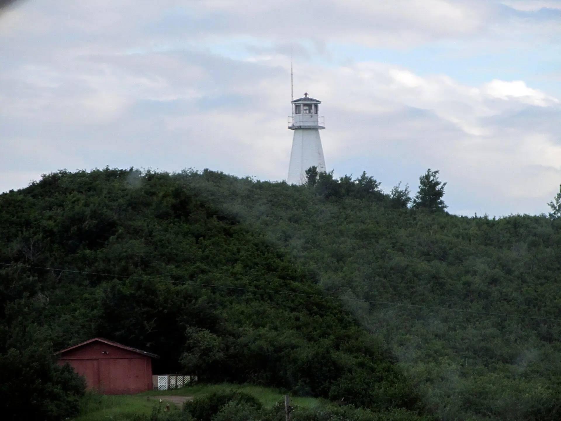 Cochin Lighthouse on the wooded hill